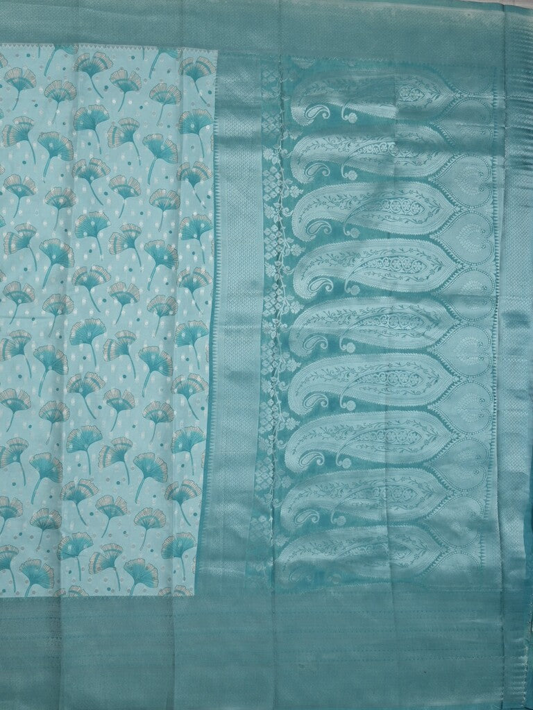 Crape fancy saree light blue color allover prints, zari motifs & zari border with rich pallu and attached blouse