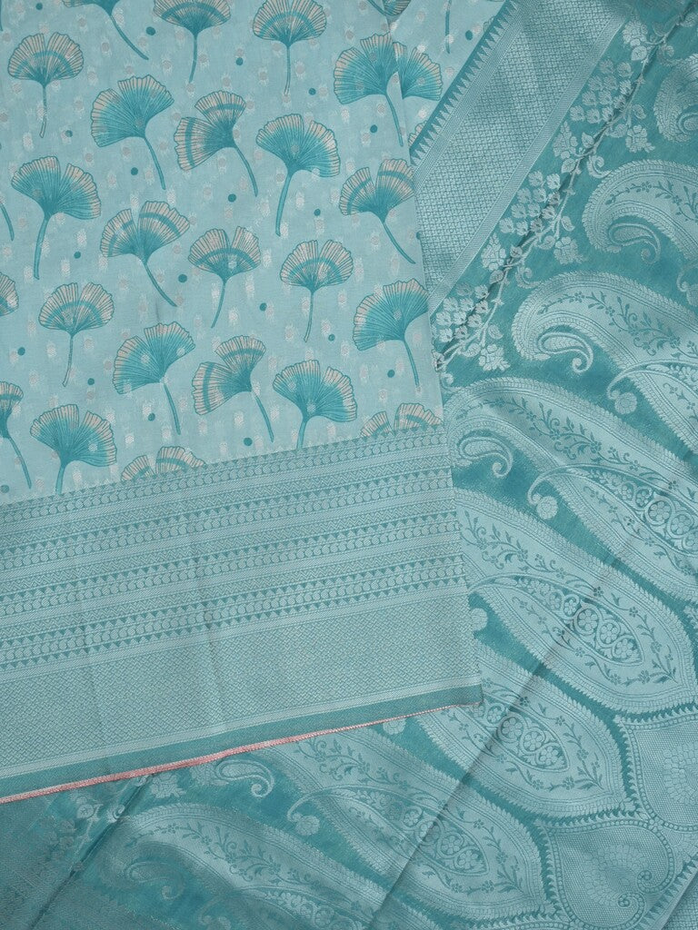 Crape fancy saree light blue color allover prints, zari motifs & zari border with rich pallu and attached blouse