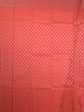 Crape fancy saree coral pink color allover prints, zari motifs & zari border with rich pallu and attached blouse