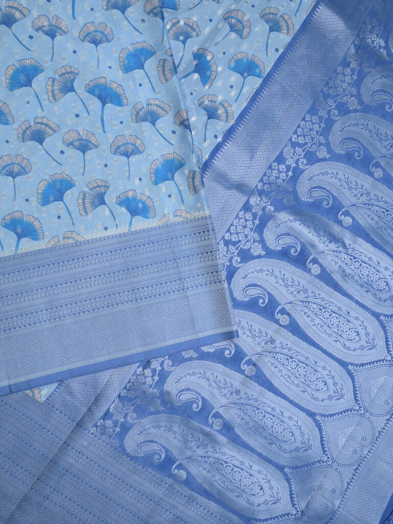 Crape fancy saree light blue color allover prints, zari motifs & zari border with rich pallu and attached blouse