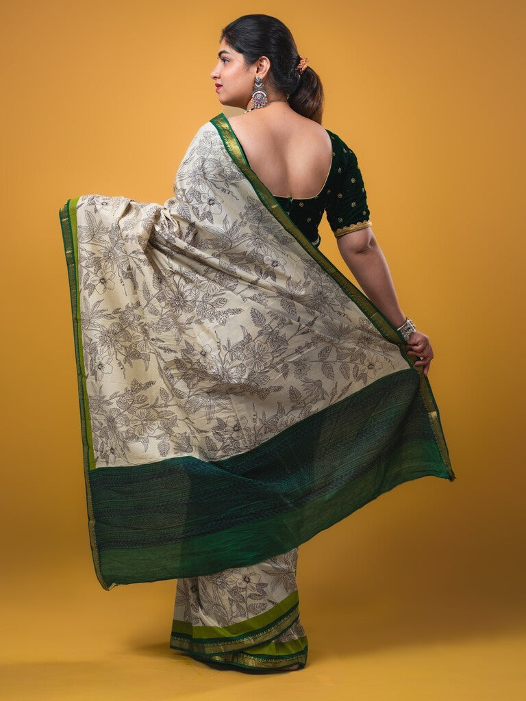 Maheswari fancy saree white color allover prints & zari border with short pallu and plain contrast blouse