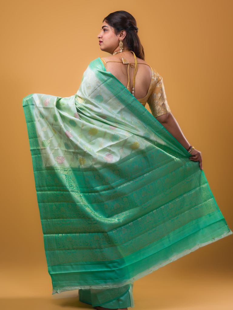 Raw mango pattu saree sea green color allover zari weaves & zari border with rich pallu and attached plain blouse