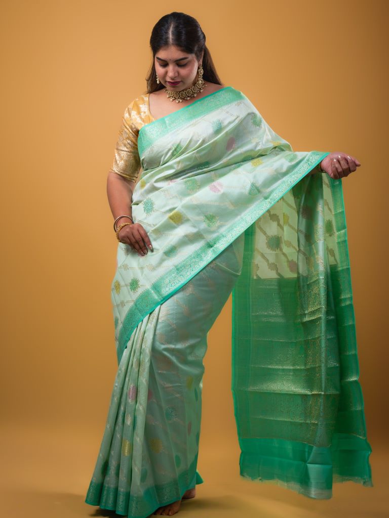 Raw mango pattu saree sea green color allover zari weaves & zari border with rich pallu and attached plain blouse