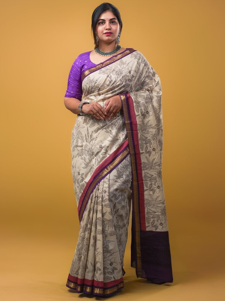 Maheswari fancy saree white color allover prints & zari border with short pallu and plain contrast blouse