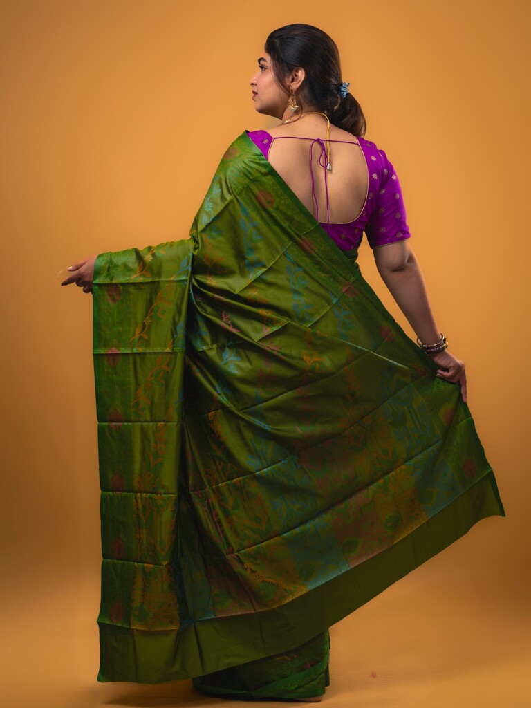 Fancy pattu saree olive green color allover weaves & small border with self pallu and attached blouse