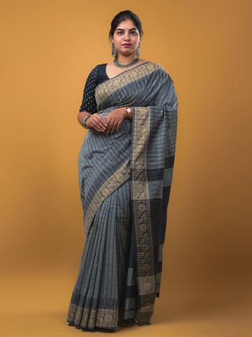 Jute kadhi cotton grey color allover checks & contrast border with contrast pallu and running blouse