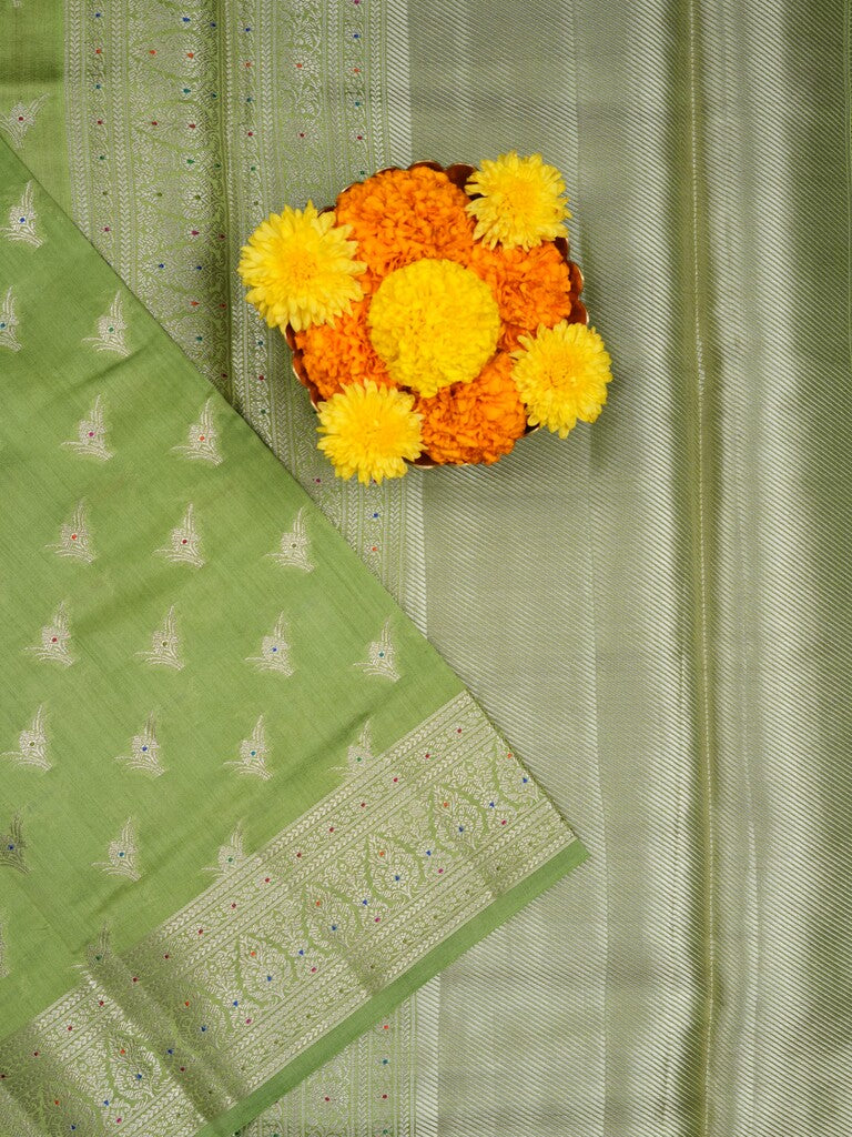 Raw mango pattu saree parrot green color allover zari motifs & zari border with zari pallu and brocade blouse