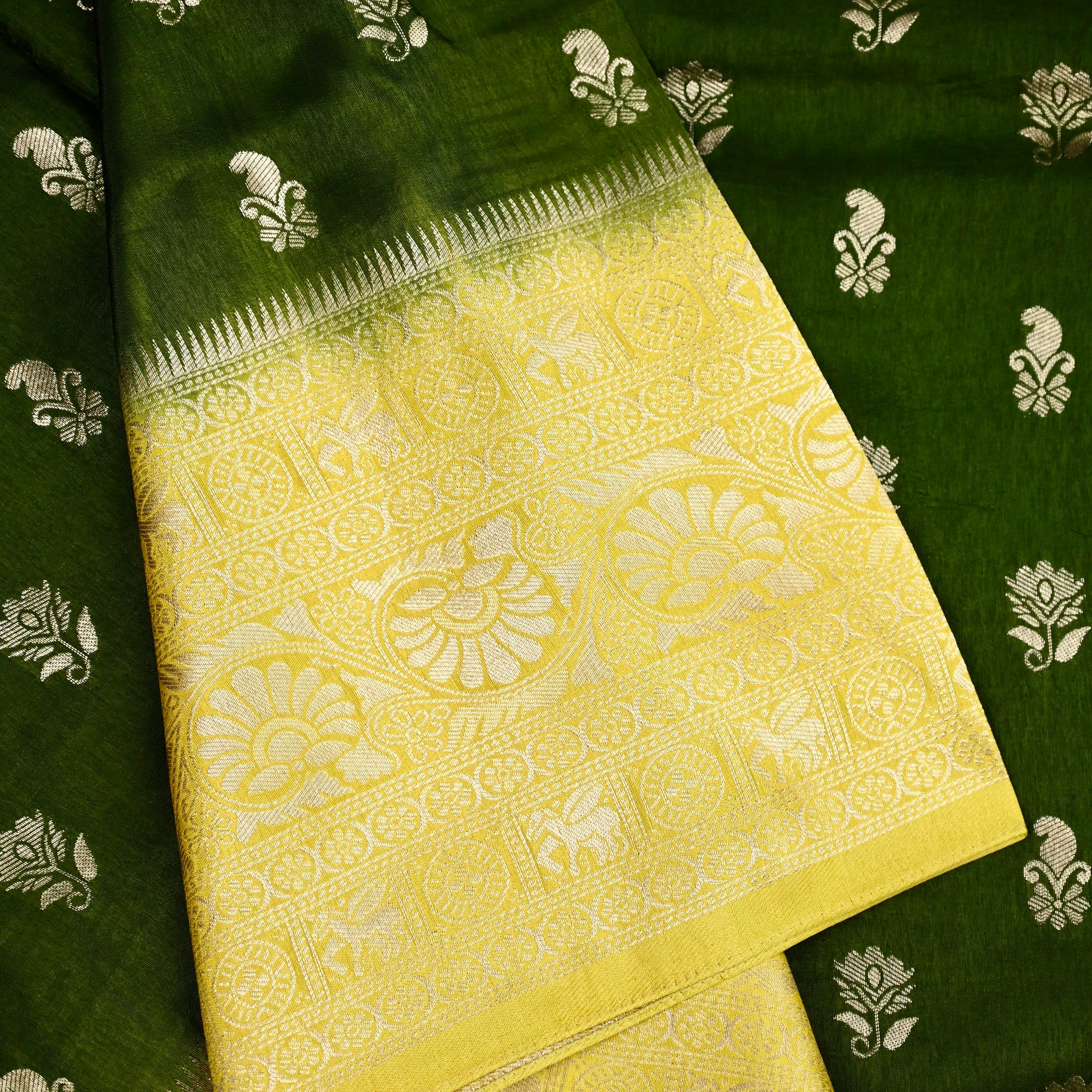 Dola silk saree green color with allover zari motive weaves, big zari wooven border, pallu and plain blouse