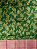 Kanchi kora fancy saree bottle green color allover zari weaving & zari border with rich contrast pallu and attached plain blouse