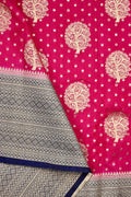 Banaras fancy saree pink and blue color with allover zari motive weaves, big zari border, pallu and plain blouse.