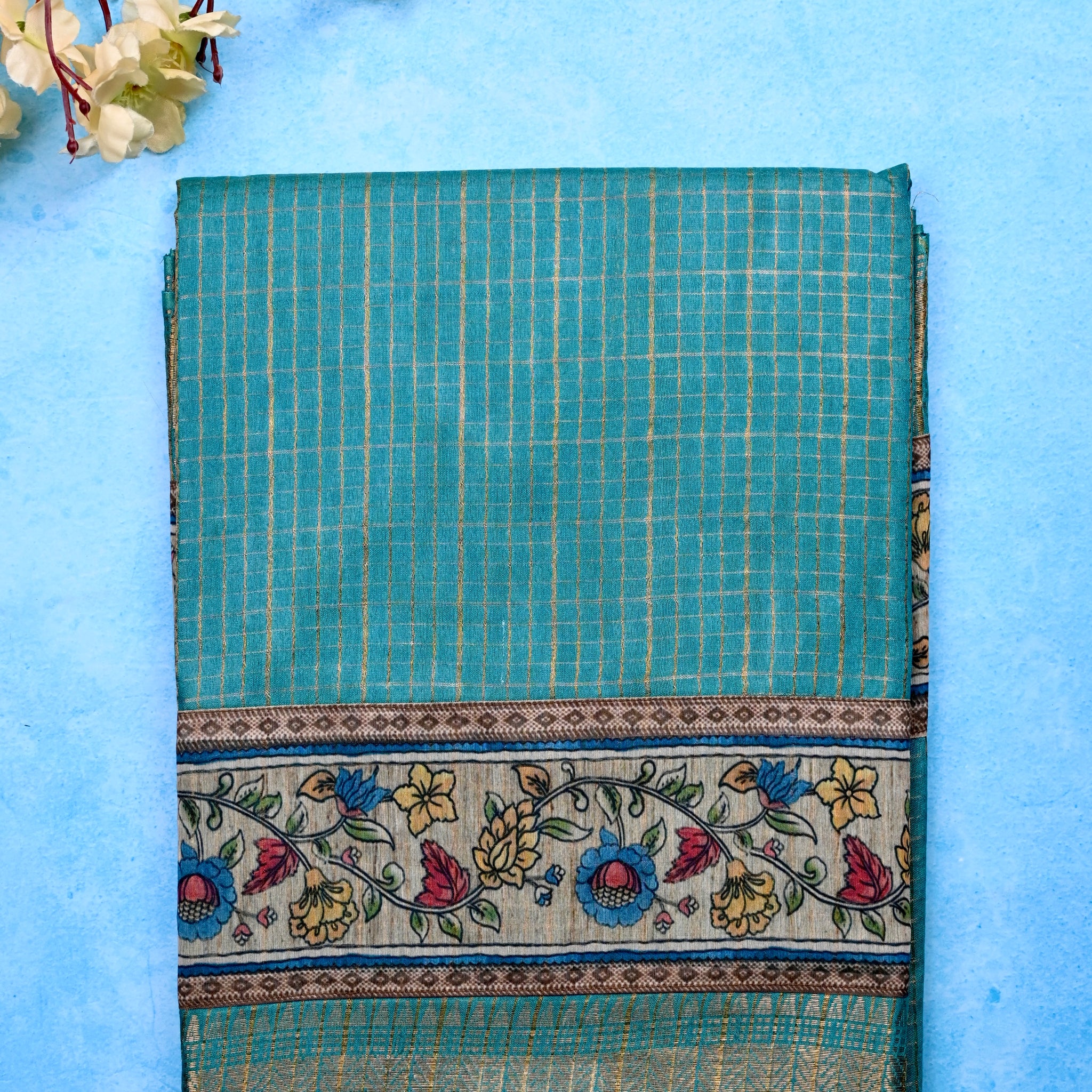 Bagalpur fancy sarees sea green color with allover zari checks with printed & zari weaving border with big pallu, printed and checks blouse.
