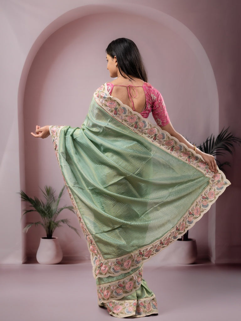 Dola tissue fancy saree lux geeen color allover stripes & embroidery cutwork border with running pallu and plain blouse
