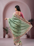 Dola tissue fancy saree lux geeen color allover stripes & embroidery cutwork border with running pallu and plain blouse