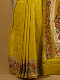 Banaras pattu fancy saree in yellow color allover zari motifs and paithani border paired with plain blouse