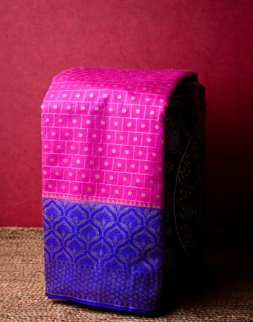 Jute fancy saree pink and blue color with allover gold zari weaves, big zari border, short pallu and brocade blouse.