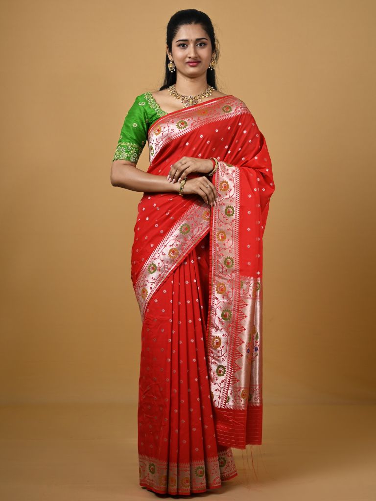 Banaras pattu fancy saree in red color allover zari motifs and paithani border paired with plain blouse