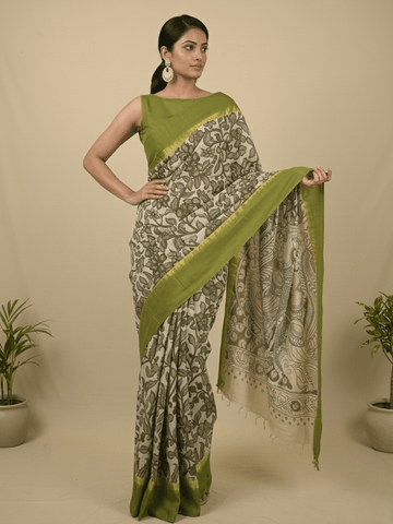 Kalamkari silk saree in cream, featuring a contrast color border and plain matching blouse