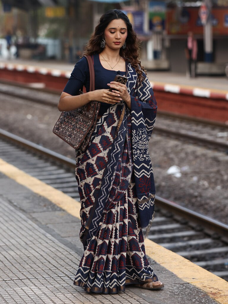 Maheswari fancy saree in navy blue color with printed pallu and attached blouse