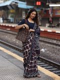 Maheswari fancy saree in navy blue color with printed pallu and attached blouse
