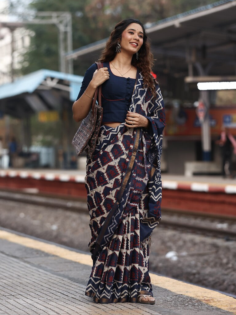 Maheswari fancy saree in navy blue color with printed pallu and attached blouse