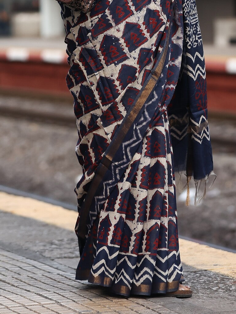 Maheswari fancy saree in navy blue color with printed pallu and attached blouse
