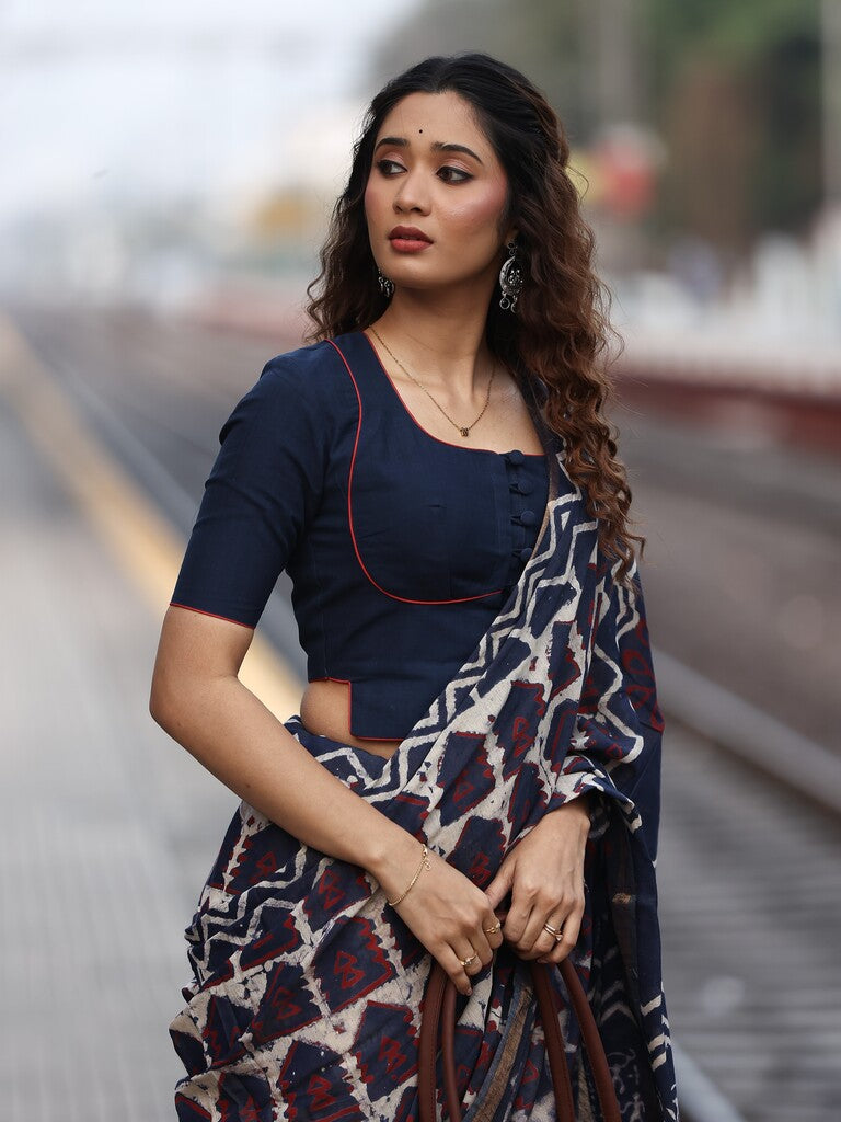 Maheswari fancy saree in navy blue color with printed pallu and attached blouse