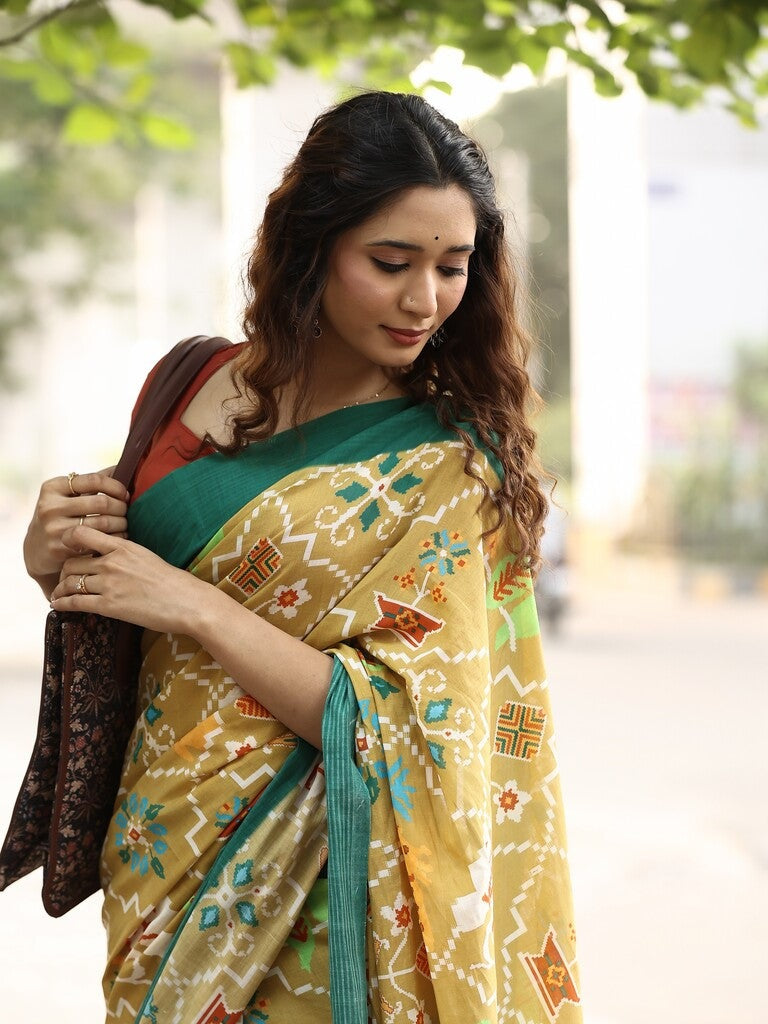 Mangalagiri cotton saree in golden yellow color with contrast pallu and plain blouse