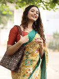 Mangalagiri cotton saree in golden yellow color with contrast pallu and plain blouse