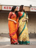 Mangalagiri cotton saree in golden yellow color with contrast pallu and plain blouse