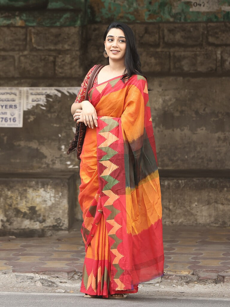 Dhaka cotton saree in orange color with contrast border and contrast pallu