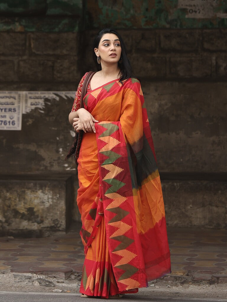 Dhaka cotton saree in orange color with contrast border and contrast pallu