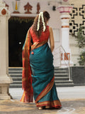 Dhaka cotton saree in peacock blue color with contrast pallu and attached blouse