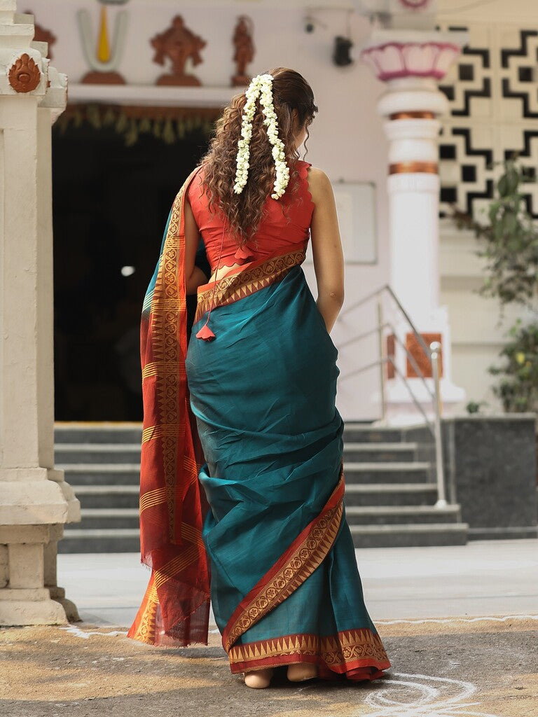 Dhaka cotton saree in peacock blue color with contrast pallu and attached blouse