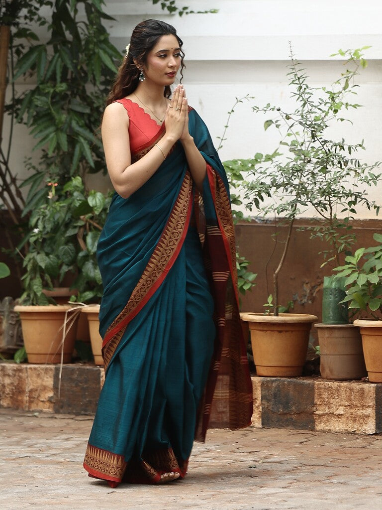 Dhaka cotton saree in peacock blue color with contrast pallu and attached blouse