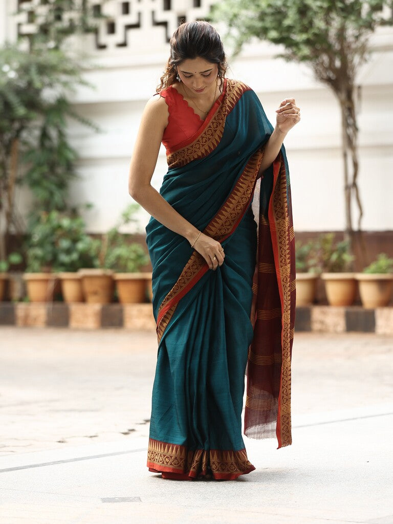 Dhaka cotton saree in peacock blue color with contrast pallu and attached blouse