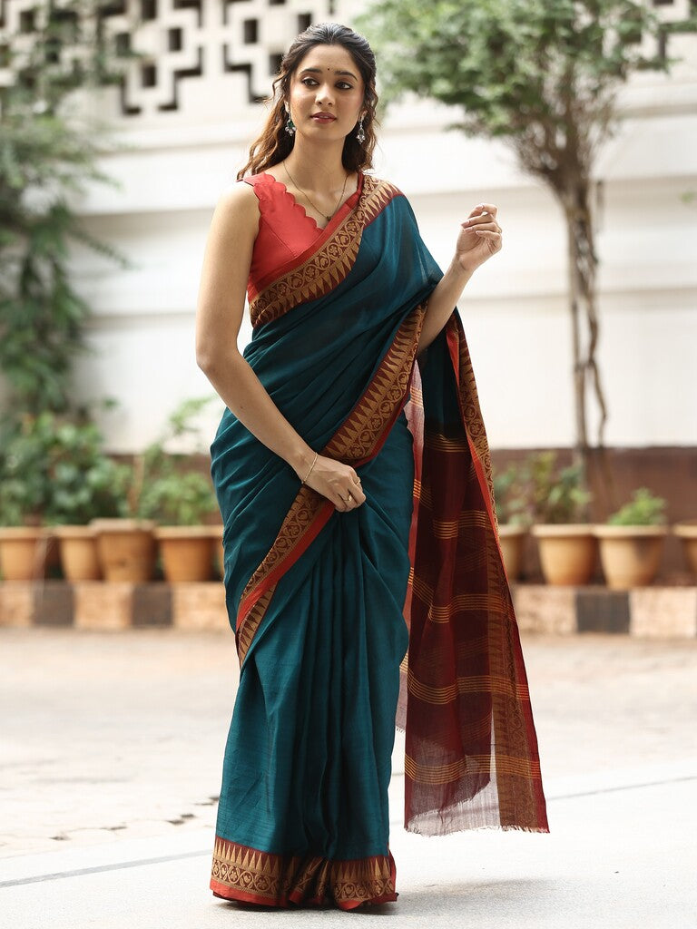 Dhaka cotton saree in peacock blue color with contrast pallu and attached blouse