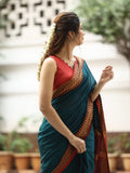 Dhaka cotton saree in peacock blue color with contrast pallu and attached blouse