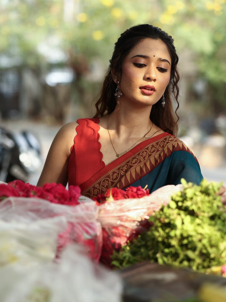 Dhaka cotton saree in peacock blue color with contrast pallu and attached blouse