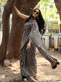 Maheswari fancy saree in black and white color with printed pallu and attached blouse