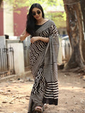 Maheswari fancy saree in black and white color with printed pallu and attached blouse