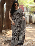Maheswari fancy saree in black and white color with printed pallu and attached blouse