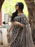 Maheswari fancy saree in black and white color with printed pallu and attached blouse