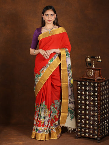 Pen kalamkari pattu saree in orange color with contrast zari border and printed pallu & attached blouse
