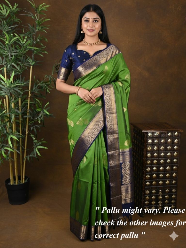 Kanchi pattu saree parrot green color allover zari motifs & zari border with rich pallu and contrast plain blouse