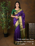 Kanchi pattu saree dark blue color allover zari motifs & zari border with rich pallu and contrast plain blouse