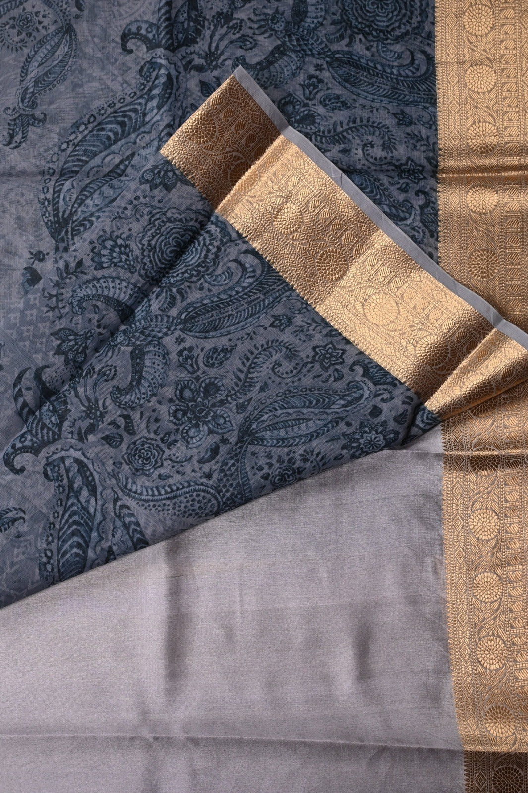 Organza Saree blue color with allover prints, small gold zari border, short pallu and plain blouse