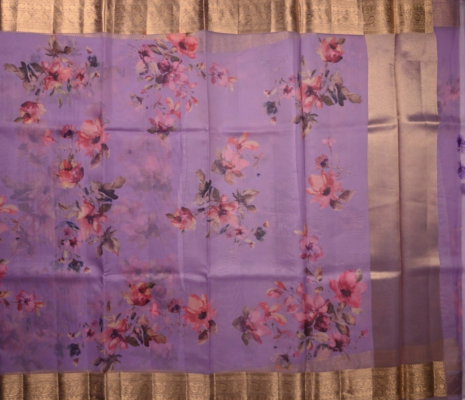 Organza Saree lavender color with allover floral digital prints, small gold zari border, short pallu and plain blouse