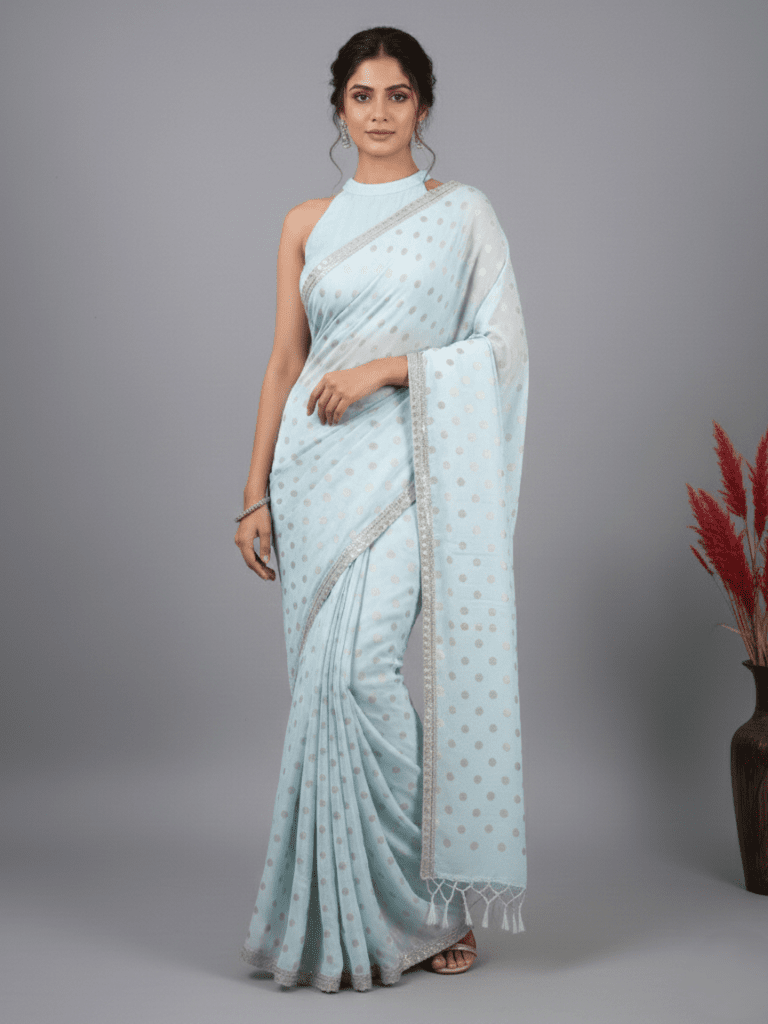 Chinnon fancy saree pastel blue color allover motifs & embroidery border with running pallu and contrast blouse