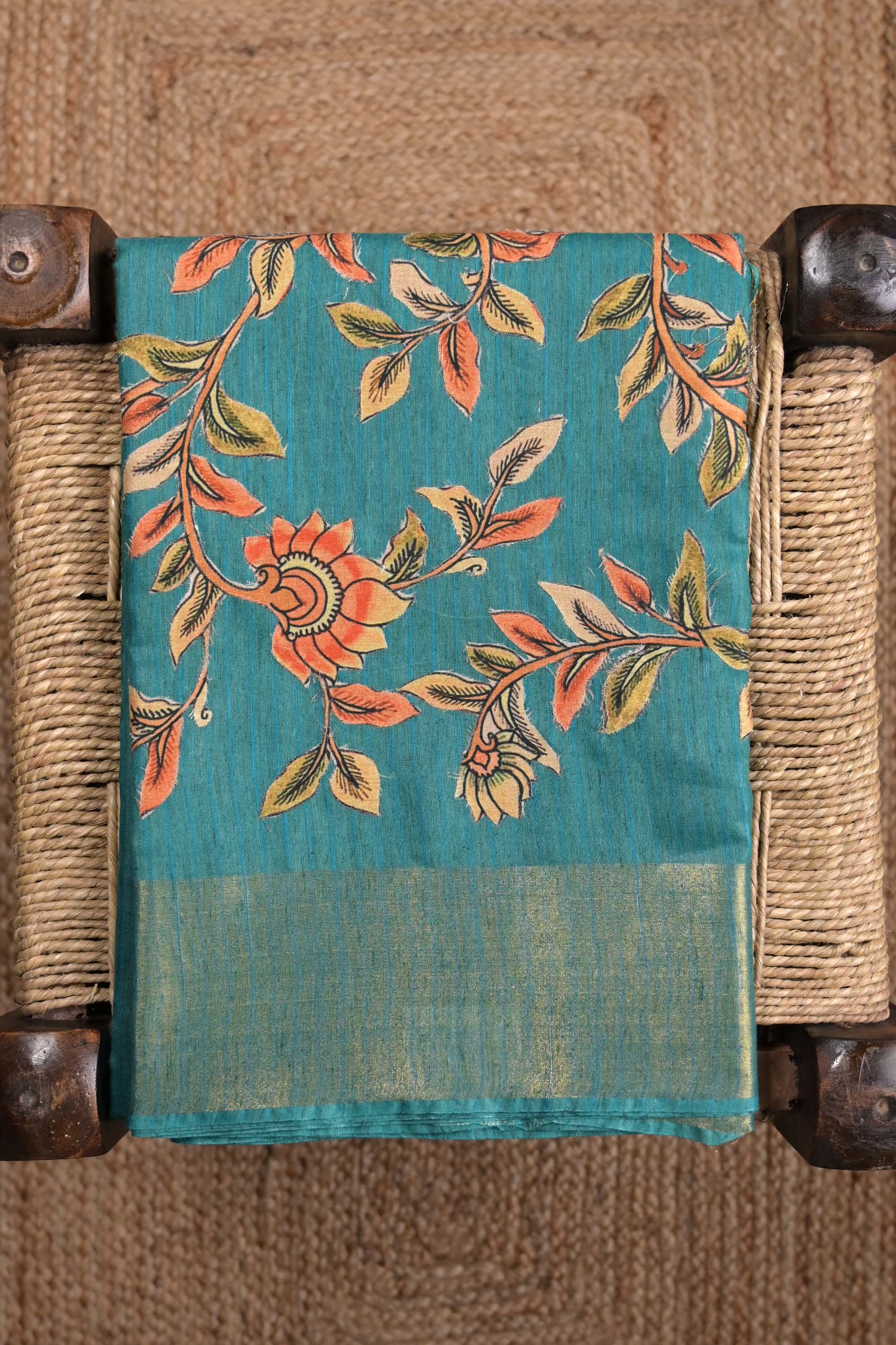 Tussar jute saree sea green color with kalamkari prints, big printed pallu, small kaddi border and printed blouse