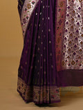 Banaras pattu fancy saree in violet color allover zari motifs and paithani border paired with plain blouse